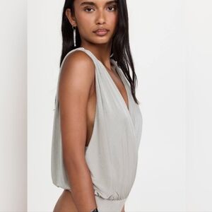 Anthropology Free People Stylish Gray Sleeveless Top and Blue Jeans